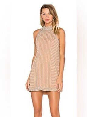 Buy now before it’s gone! Tan and White Mini Dress